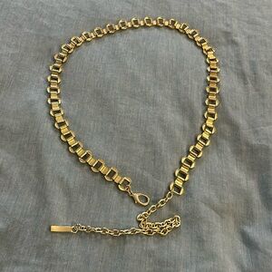 Women’s gold metal belt. Adjustable Length is 42” with large loops length 30”.